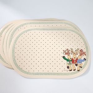 Set of 8 vintage 80s Christmas vinyl placemats with reindeer.